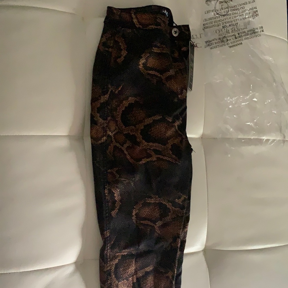 Skinny legs, snake print stretchy jeans.